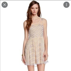 Free People mesh and beaded dress . Small blemish of beading see photos